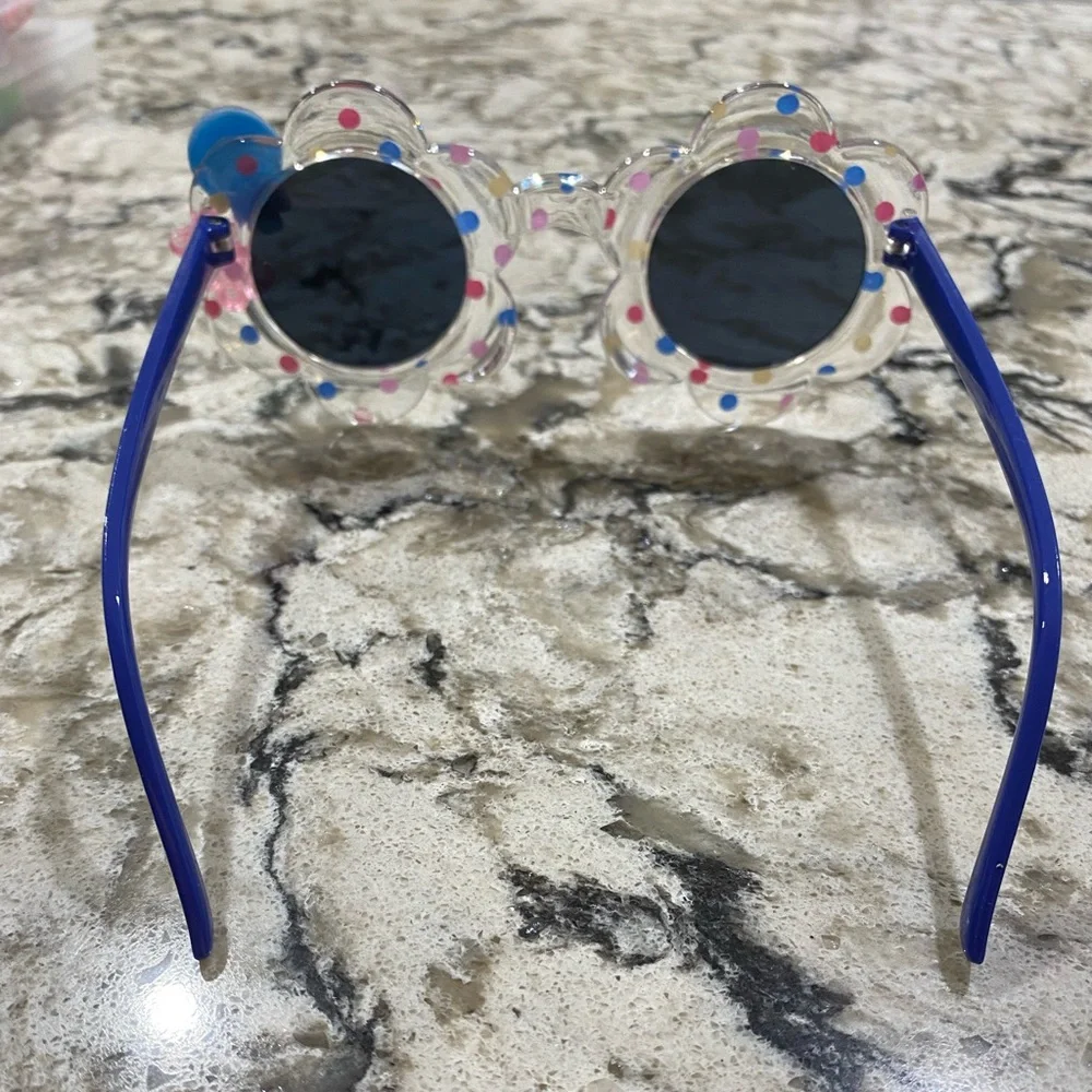 Girls flower shaped blue multi colored dot sunglasses